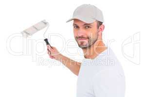 Handyman holding paint roller