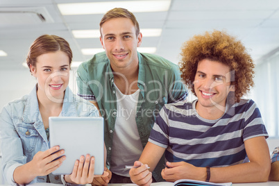 Fashion students using tablet