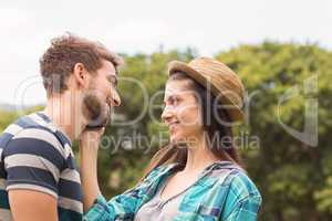 Young couple smiling at each other