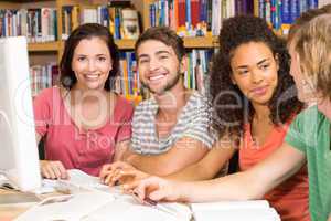 College students using computer in library