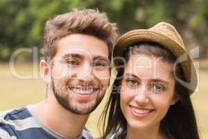 Young couple smiling at the camera