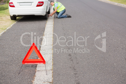 Man fixing tire