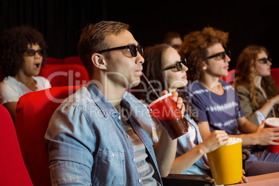 Young friends watching a 3d film