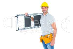 Happy manual worker carrying step ladder