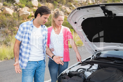 Couple after a car breakdown