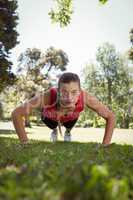 Fit woman in plank position