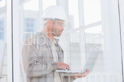 architect using laptop in office