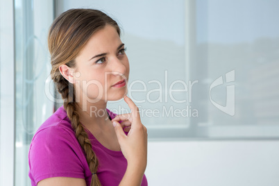 Thoughtful casual young woman