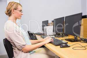 Student working on computer in classroom