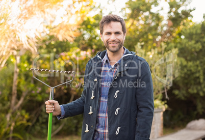 Man raking in his garden