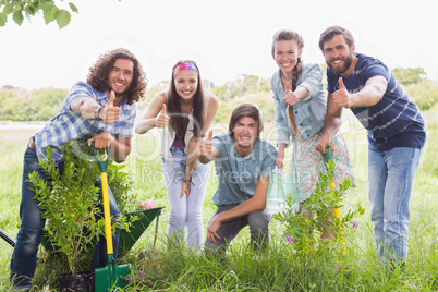 Happy friends gardening for the community