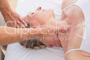 Woman receiving neck massage