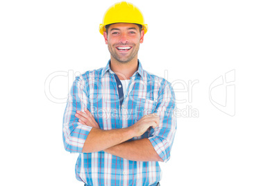 Smiling handyman standing arms crossed