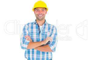 Smiling handyman standing arms crossed