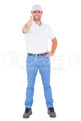 Portrait of confident handyman gesturing thumbs up