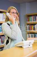 Pretty librarian answering the phone