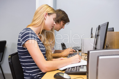 Students working together on computer