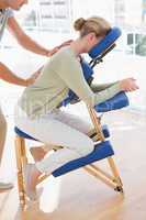 Woman having back massage