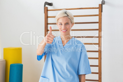 Smiling therapist with thumbs up