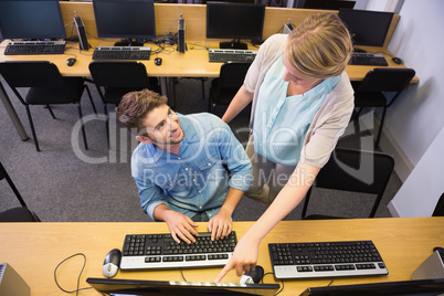 Students working on computer together