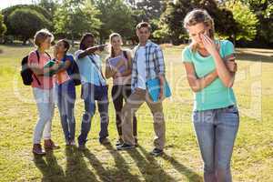 Student being bullied by a group of students