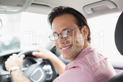 Man smiling while driving Man smiling while driving