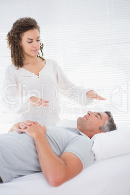 Therapist working with man