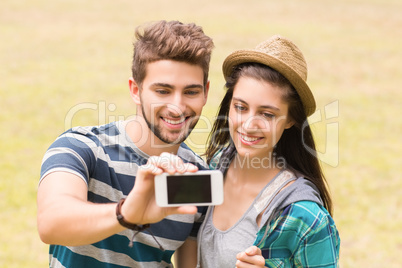 Young couple taking a selfie