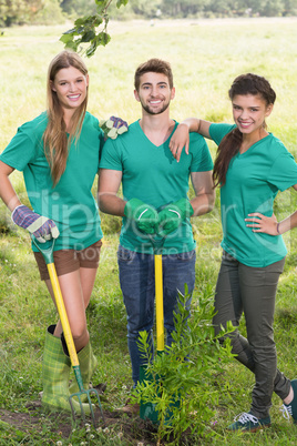 Happy friends gardening for the community
