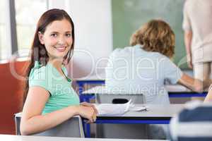 Beautiful female student in class