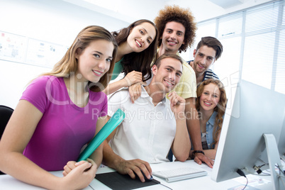 Smiling students in computer class