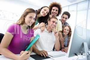 Smiling students in computer class