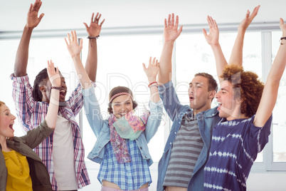 Fashion students cheering together