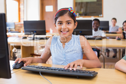 Cute pupils in computer class