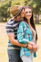 Young couple hugging in the park