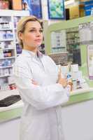 Junior pharmacist with arms crossed
