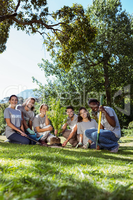 Team of volunteers gardening together