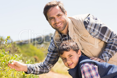 Father and son hiking in the mountains