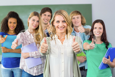 College students gesturing thumbs up