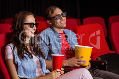 Young couple watching a 3d film