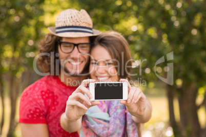 Friends taking a selfie in the park Friends taking a selfie in the park
