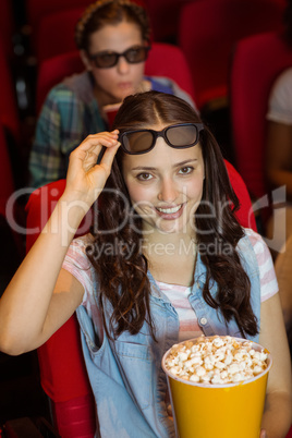 Young friends watching a 3d film