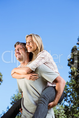 Happy couple having fun in the park