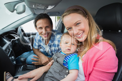 Parents and baby on a drive