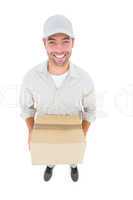 High angle portrait of handsome delivery man with cardboard box