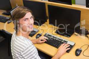 Student working on computer in classroom