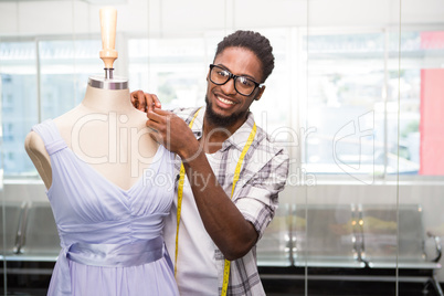Male fashion designer and mannequin