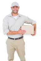 Portrait of happy delivery man with cardboard box