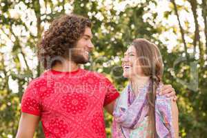 Friends smiling in the park