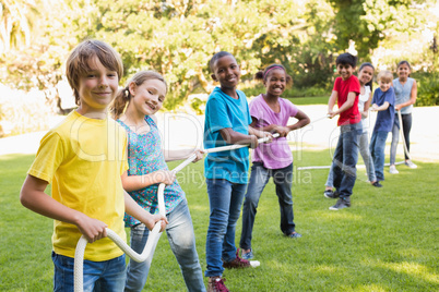 Happy friends playing in the park